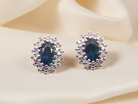 A Pair of Sapphire and Diamond Cluster Earrings