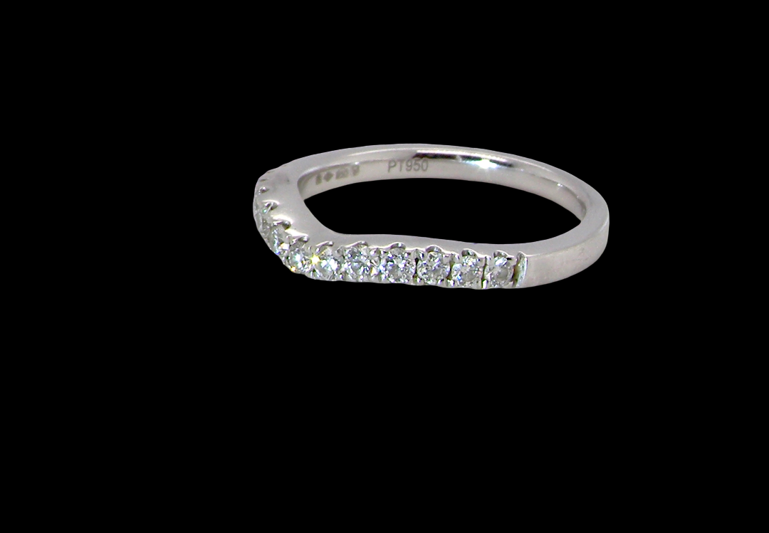 A Platinum half hoop ring featuring a gently contoured U-shaped centre, designed to allow a cluster or solitaire ring to sit comfortably alongside. side