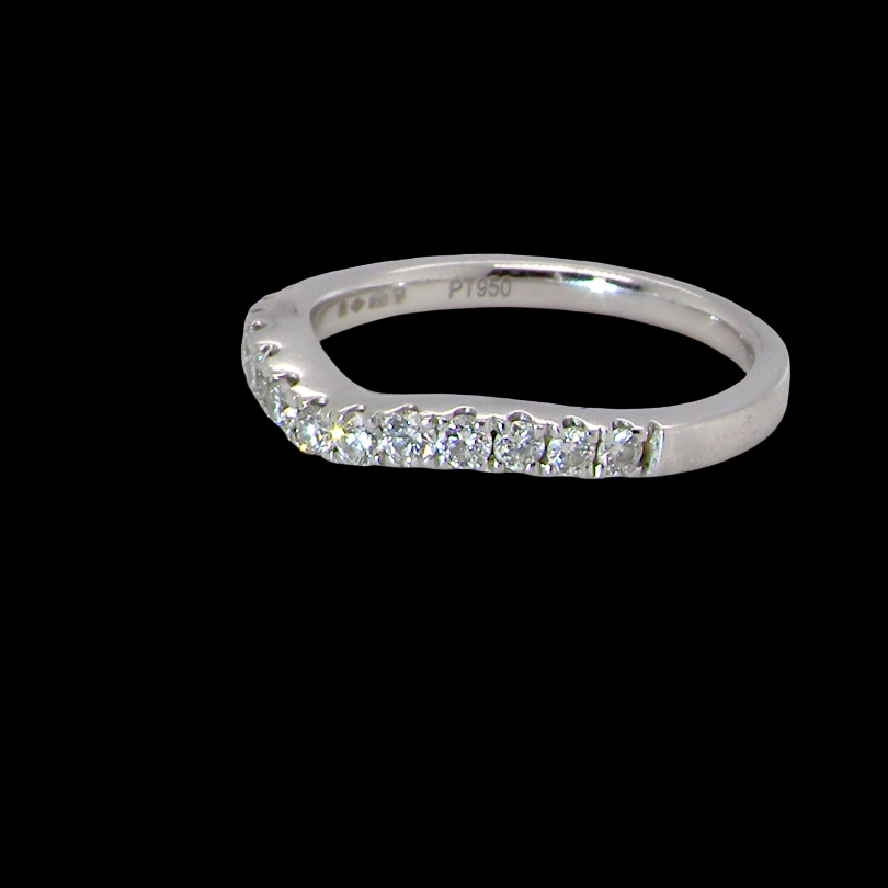 A Platinum half hoop ring featuring a gently contoured U-shaped centre, designed to allow a cluster or solitaire ring to sit comfortably alongside. side