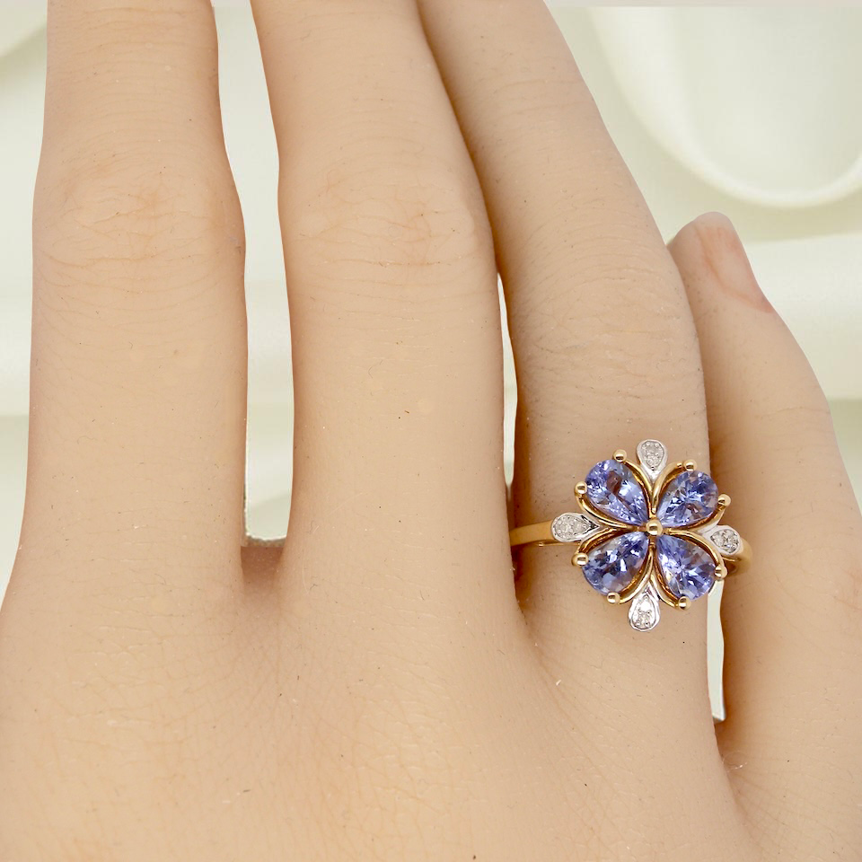 A Tanzanite and Diamond cluster ring