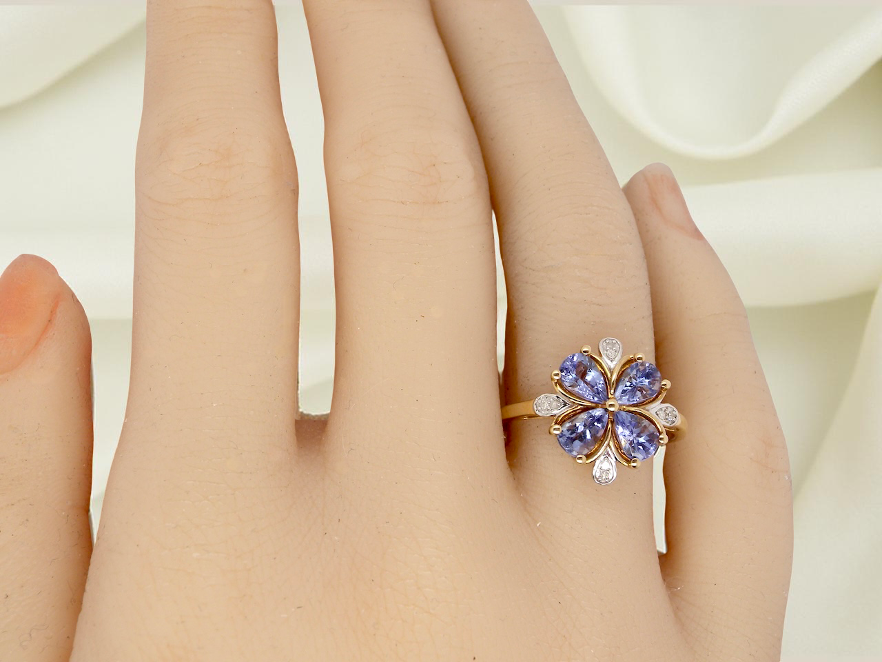 A Tanzanite and Diamond cluster ring