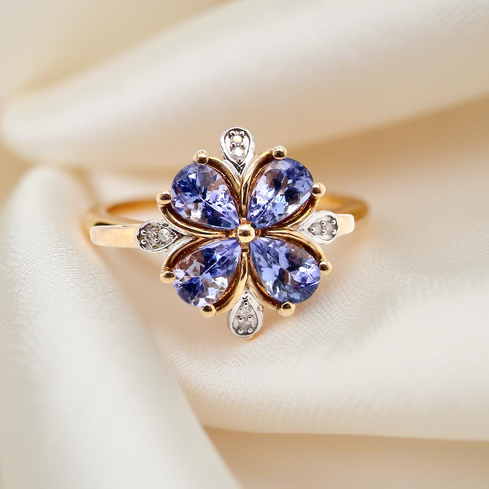 A Tanzanite and Diamond cluster ring