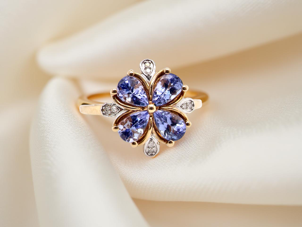 A Tanzanite and Diamond cluster ring