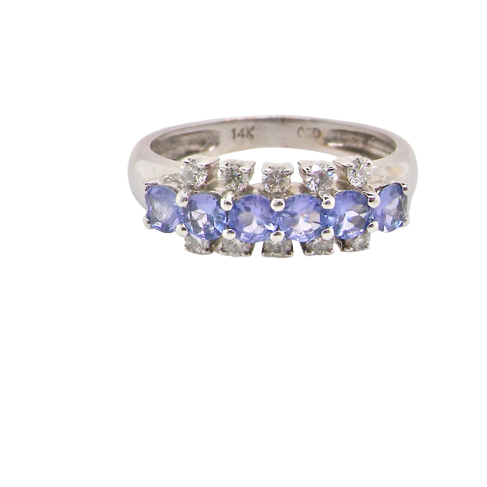 A Tanzanite and Diamond half hoop ring