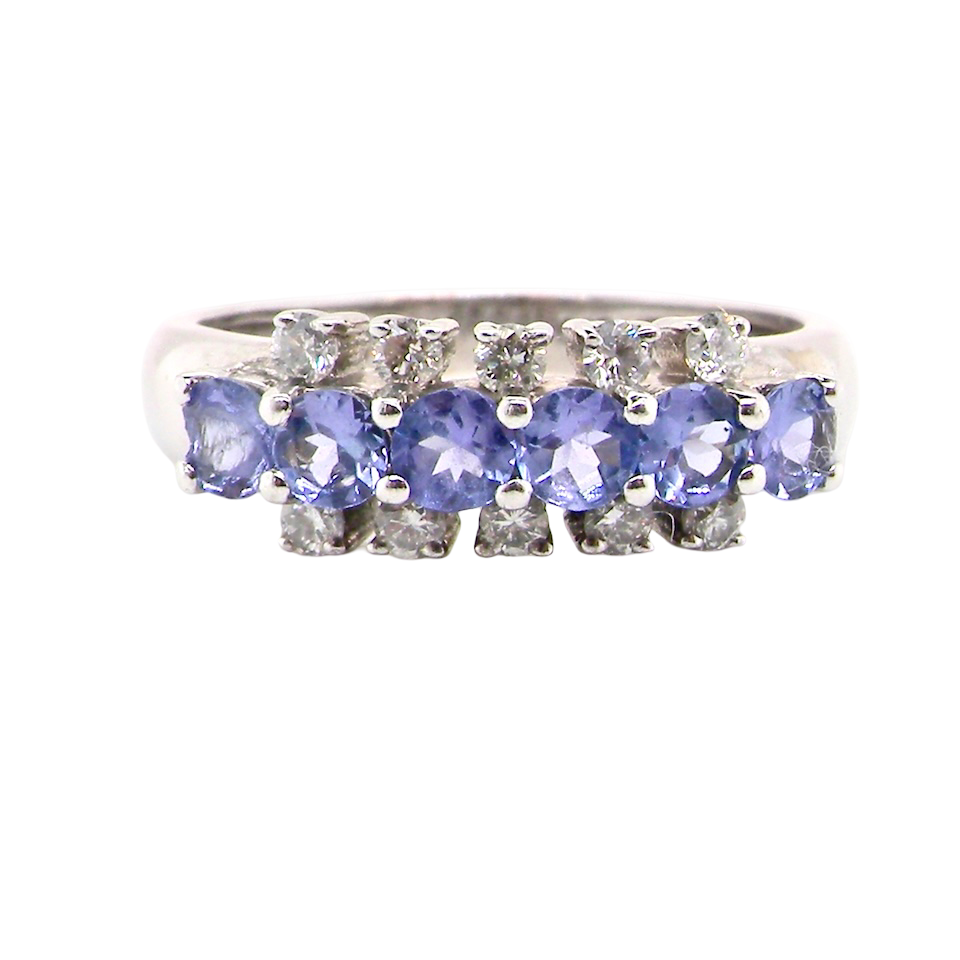 A Tanzanite and Diamond half hoop ring