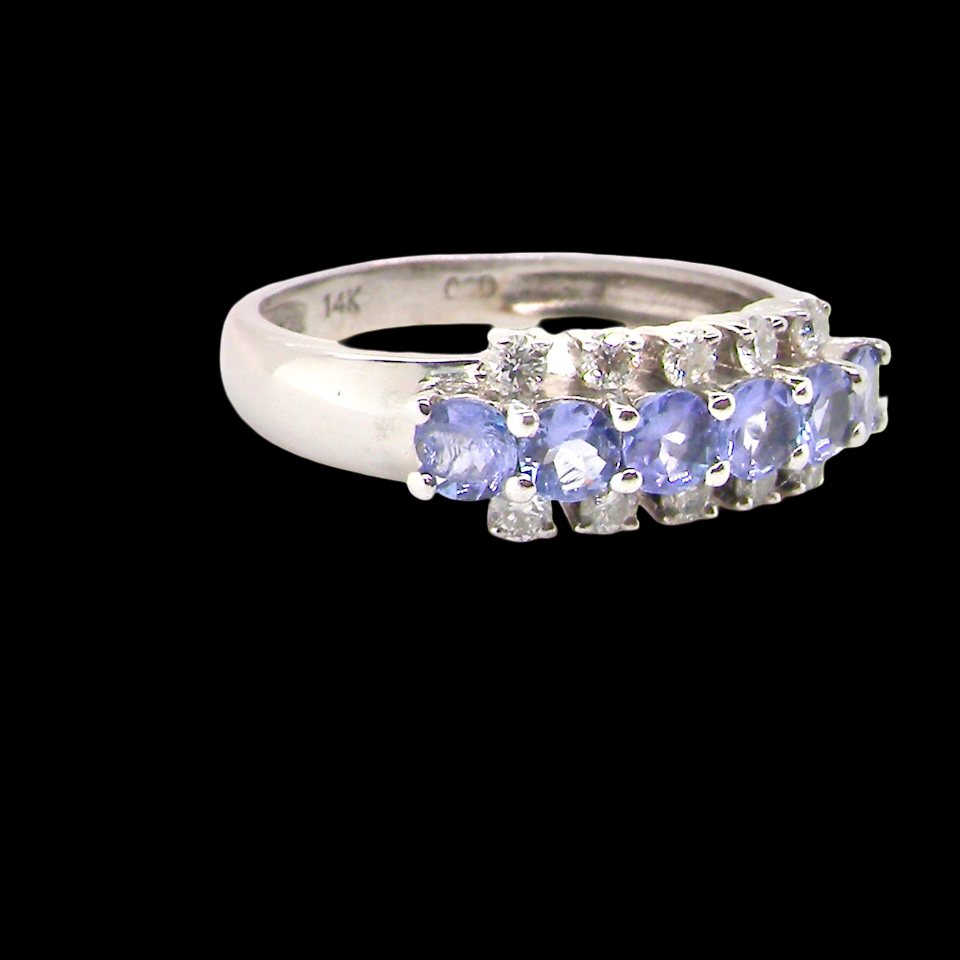 A Tanzanite and Diamond half hoop ring