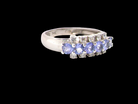 A Tanzanite and Diamond half hoop ring
