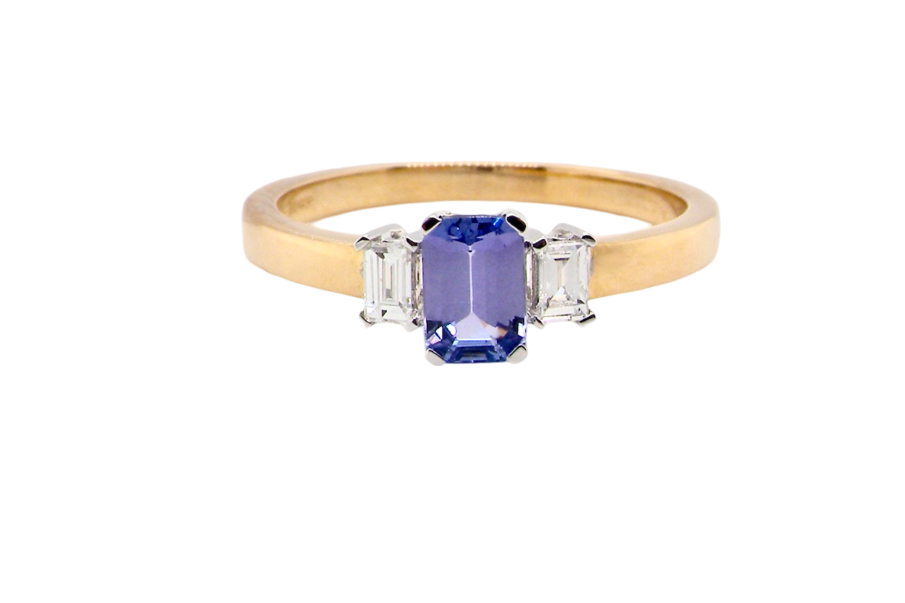 A Tanzanite and Diamond three stone ring