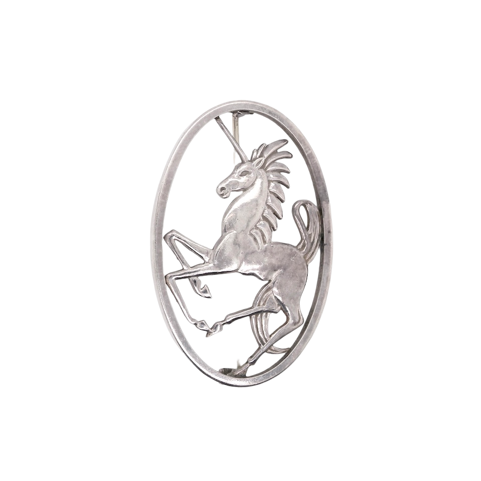 A Unicorn brooch by Geoffrey Bellamy