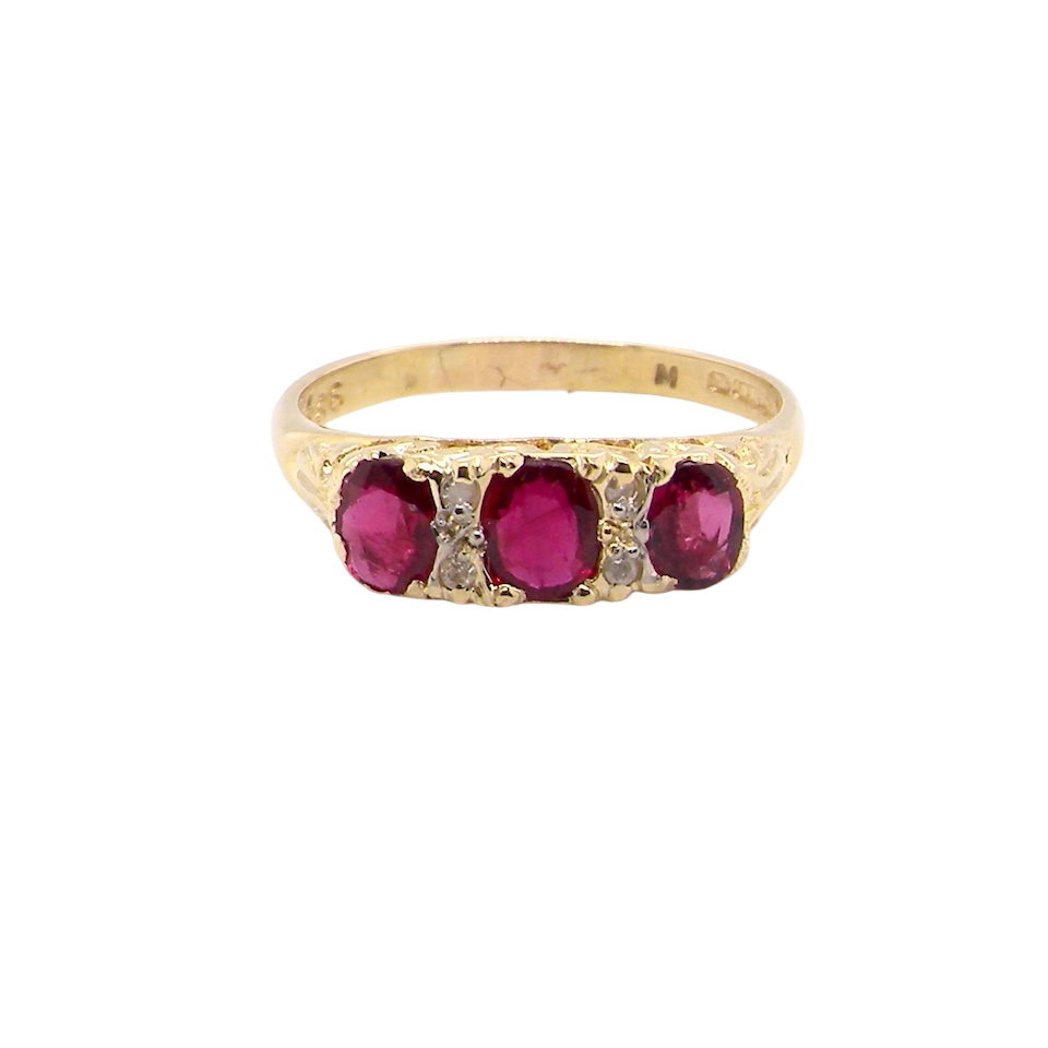 A Victorian Style 18 carat Gold Ruby & Diamond Boat Ring (London 1978)