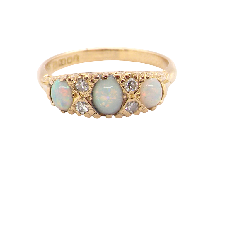 A Victorian style opal and diamond ring