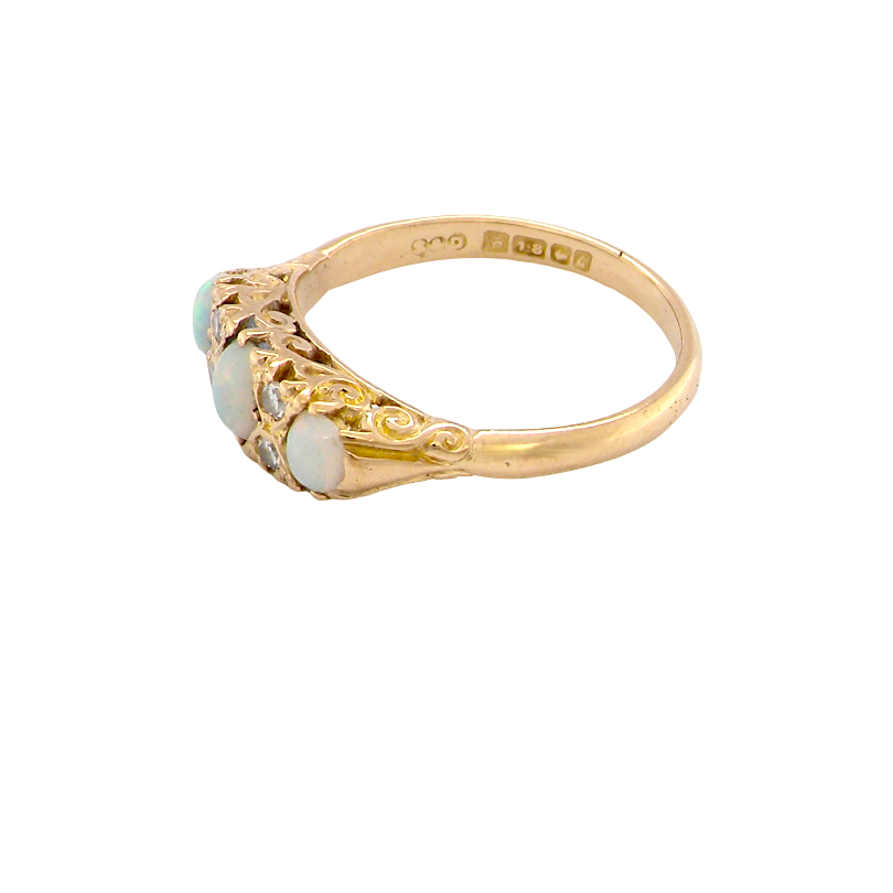 A Victorian style opal and diamond ring side