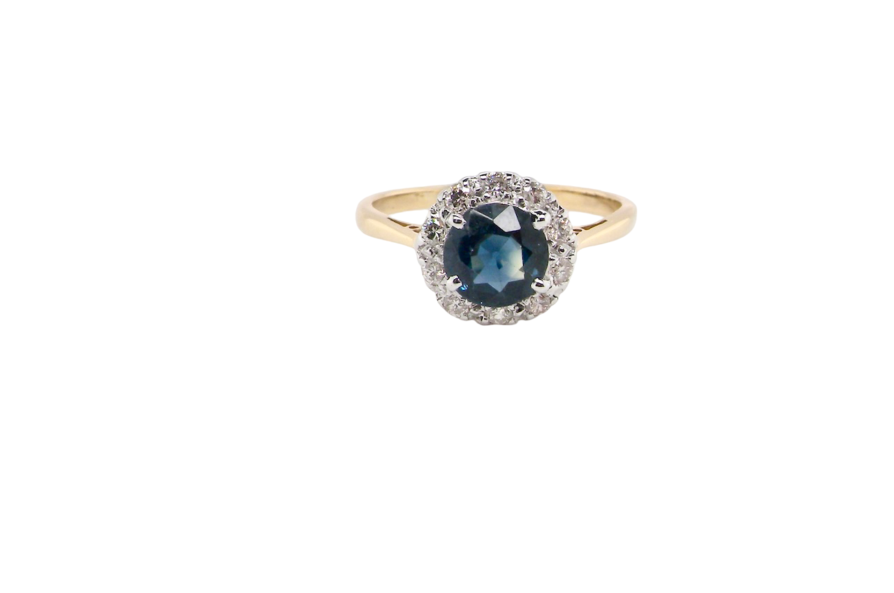 A Vintage 1960s Sapphire & Diamond Cluster Ring