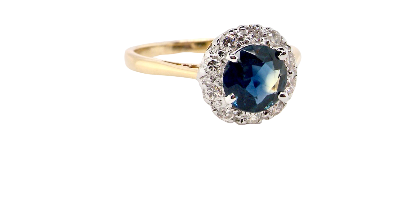 A Vintage 1960s Sapphire & Diamond Cluster Ring