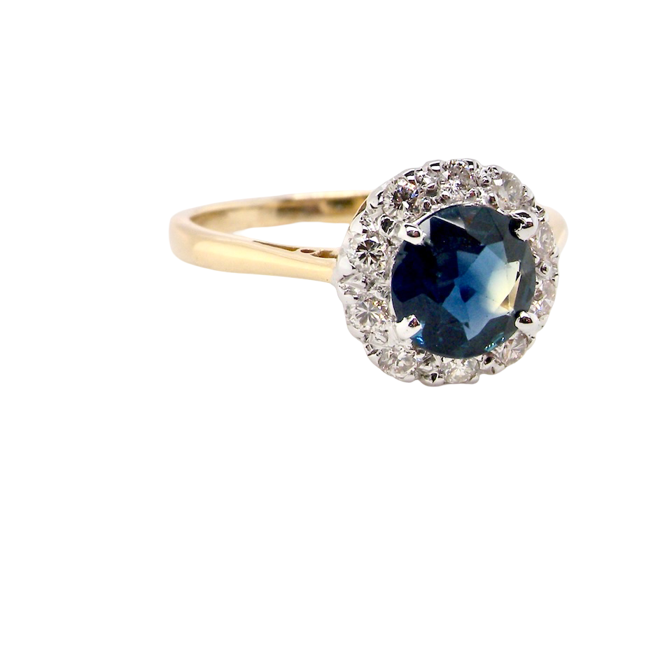 A Vintage 1960s Sapphire & Diamond Cluster Ring