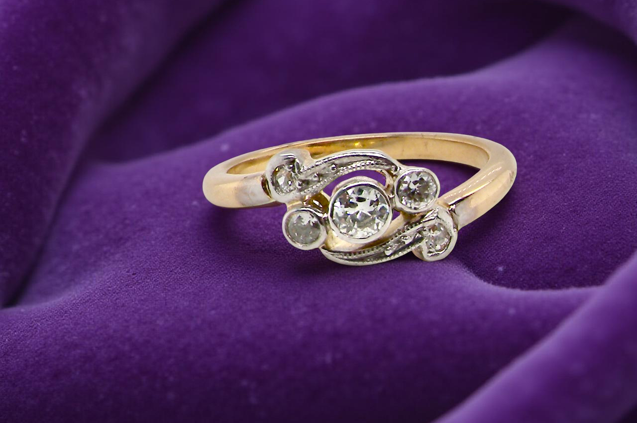 A Vintage Platinum & 18 carat Gold Diamond Crossover Ring (c.1930–1940)