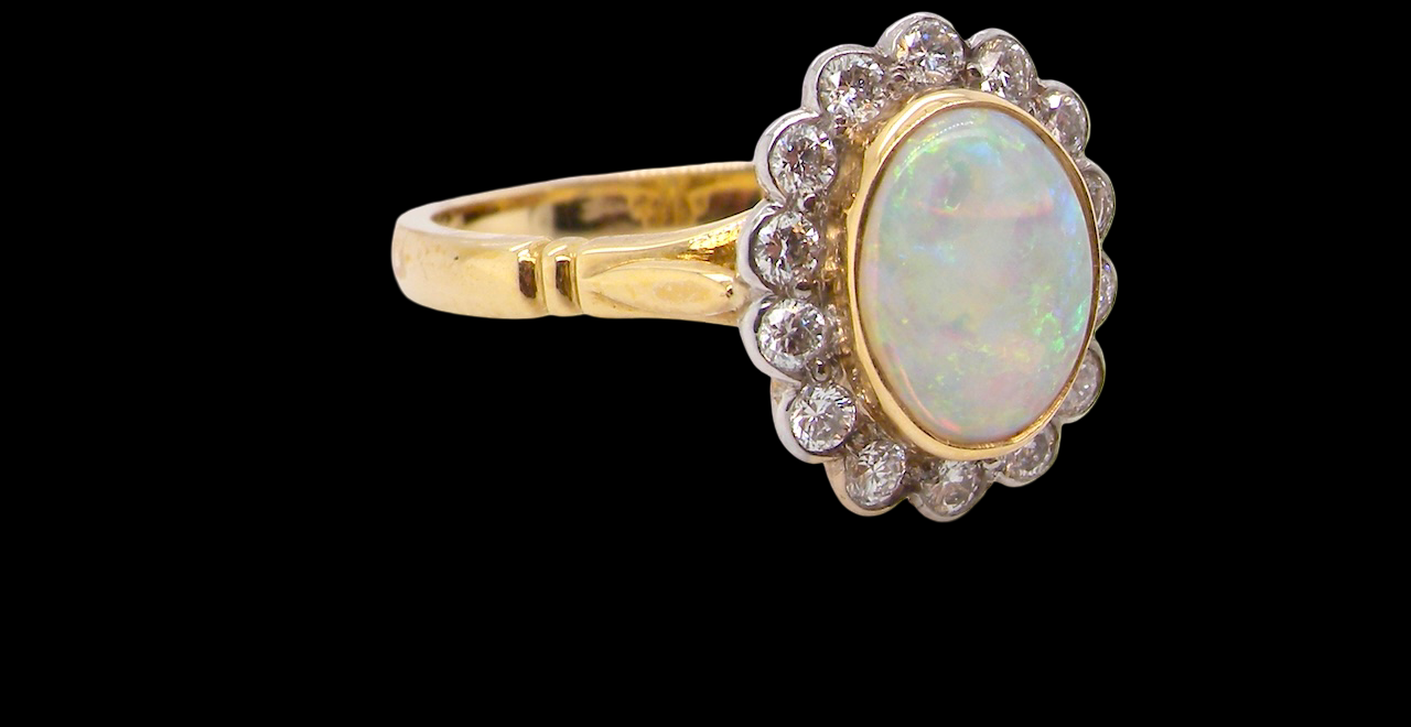 A White Opal and Diamond Ring