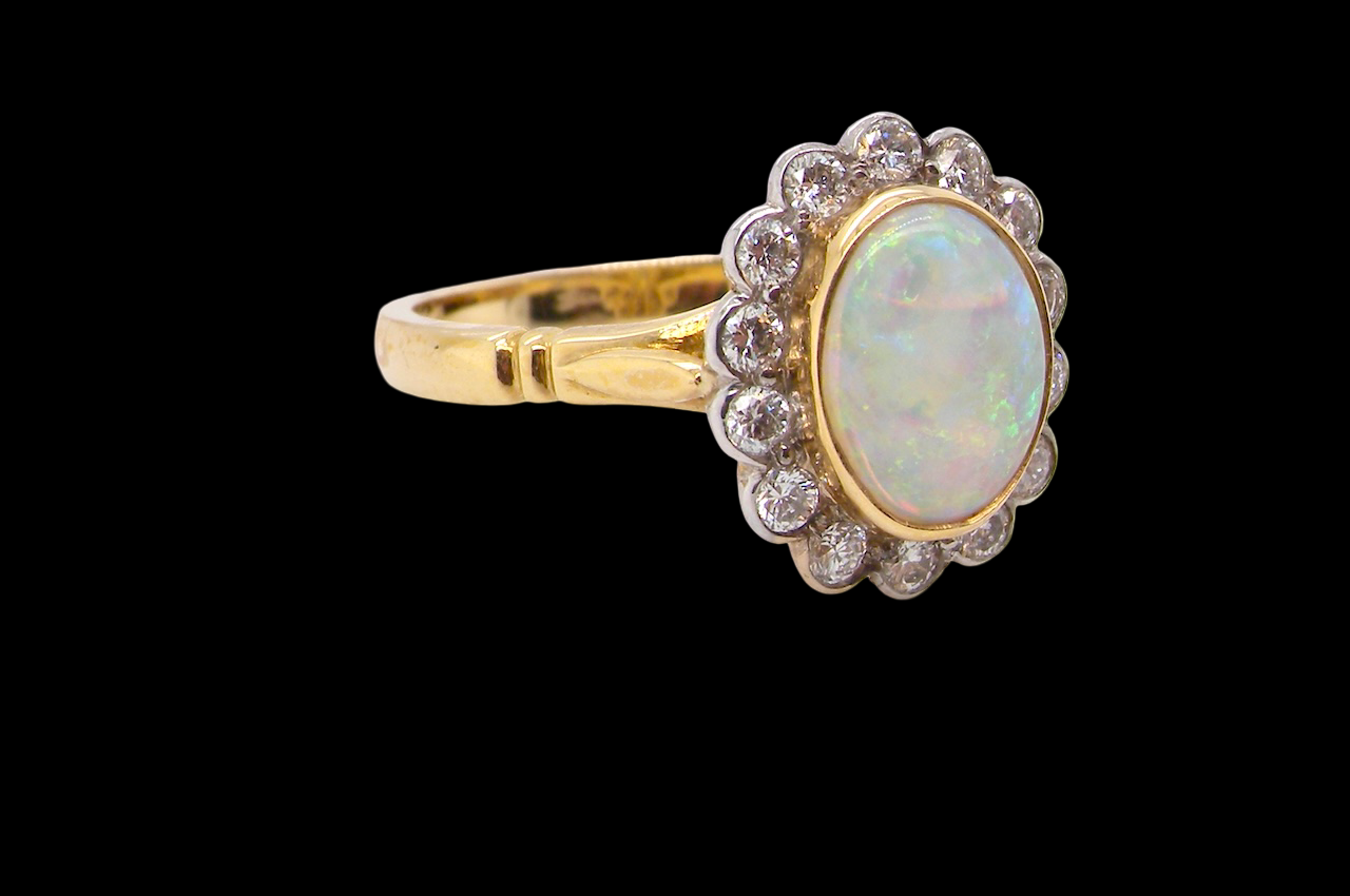 A White Opal and Diamond Ring