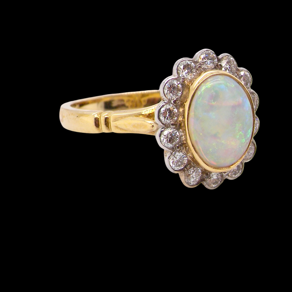 A White Opal and Diamond Ring