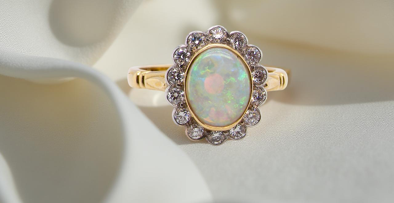 A White Opal and Diamond engagement ring