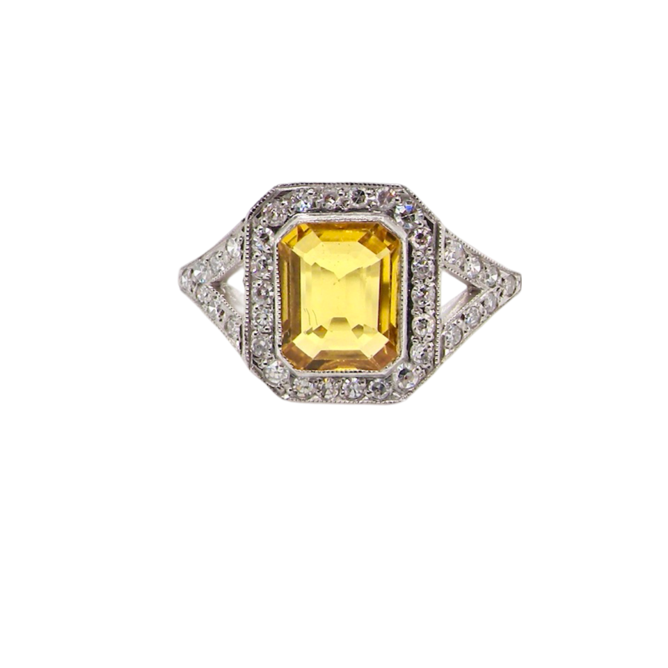 A Yellow Sapphire and Diamond Cluster Ring