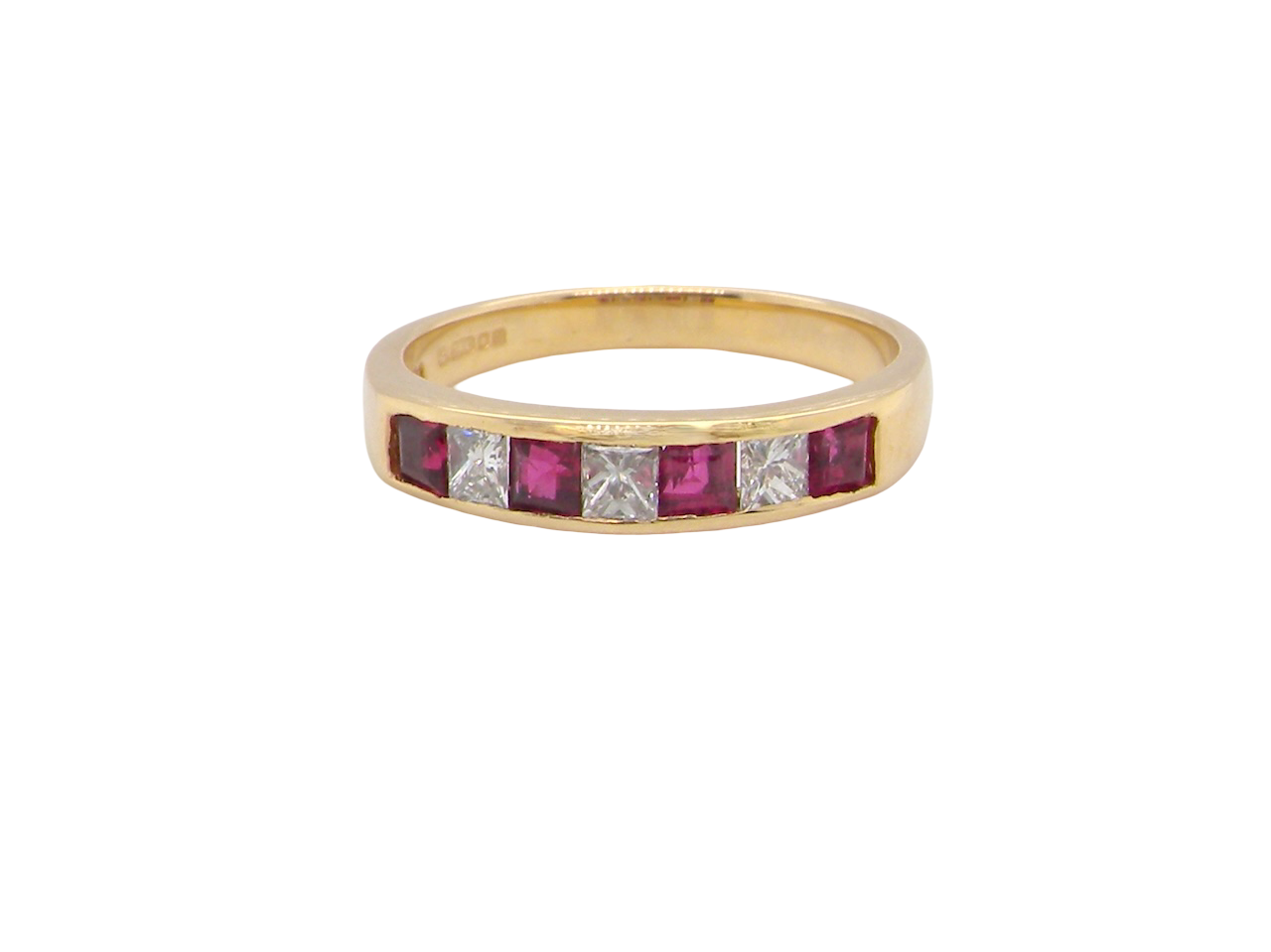 A beautiful 18-carat gold half-hoop eternity ring set with alternating rubies and diamonds.