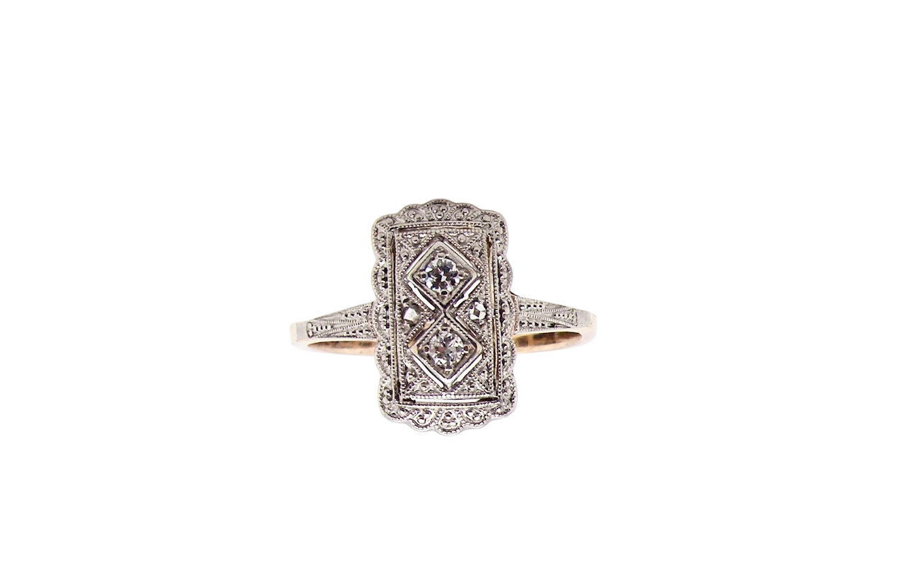 A beautiful Edwardian era plaque-style diamond cluster ring