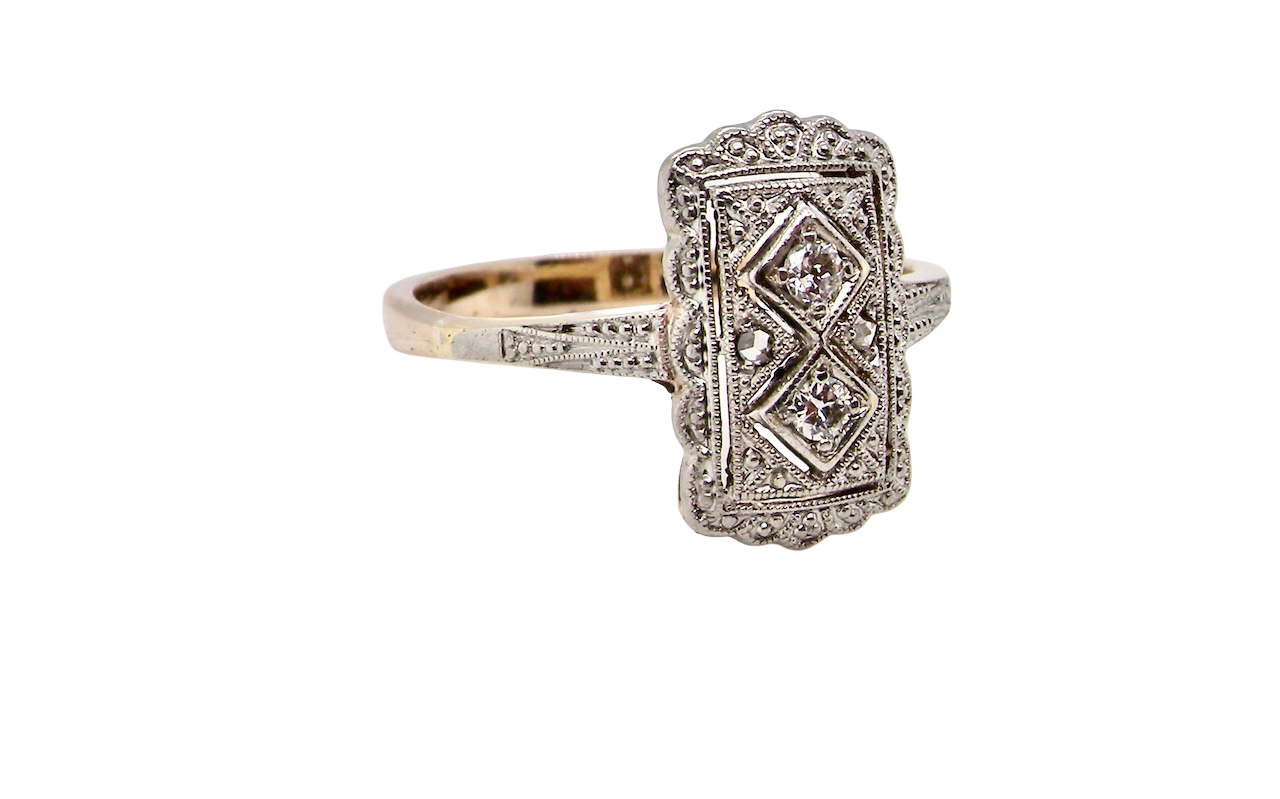 An Edwardian era plaque diamond cluster ring
