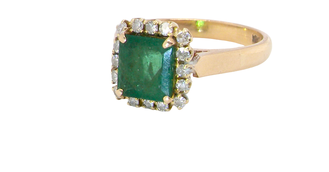 A beautiful cluster ring set with a large square-cut emerald measuring approximately 7 x 7mm, displaying a deep grass-green colour