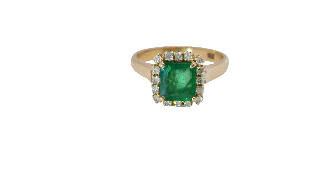 A beautiful cluster ring set with a large square-cut emerald measuring approximately 7 x 7mm, displaying a deep grass-green colour with natural inclusions,