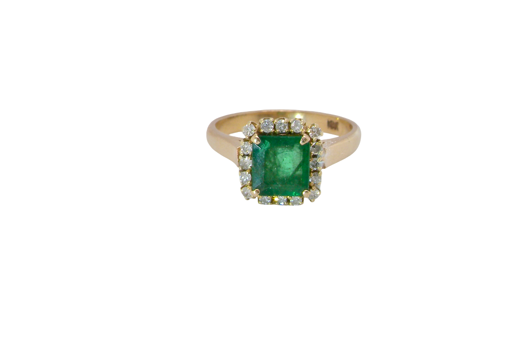 A beautiful cluster ring set with a large square-cut emerald measuring approximately 7 x 7mm, displaying a deep grass-green colour with natural inclusions,