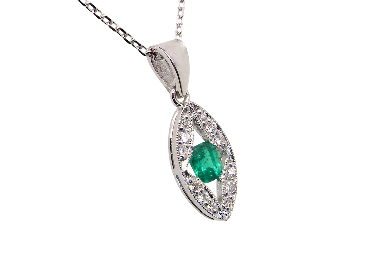 A beautiful modern 18ct white gold pendant featuring a cushion-cut emerald measuring approximately 4 x 3.5mm (estimated 0.35 carat),