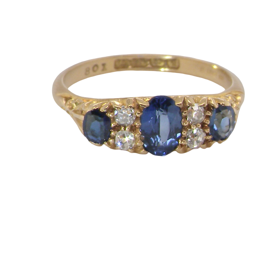 A beautiful Edwardian sapphire and diamond ring, dating to 1907, crafted in 18 carat gold with a traditional hand-carved boat-shaped setting.