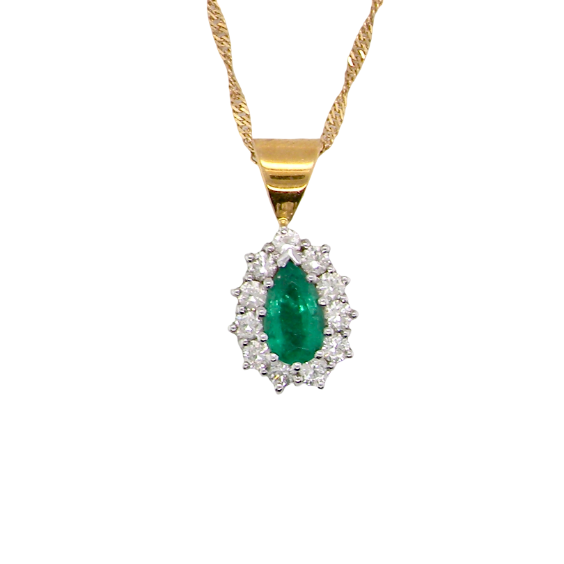 A beautiful pear shaped pendant. The emerald measures 7x5mm (0.75 carats est), good deep grass green colour.