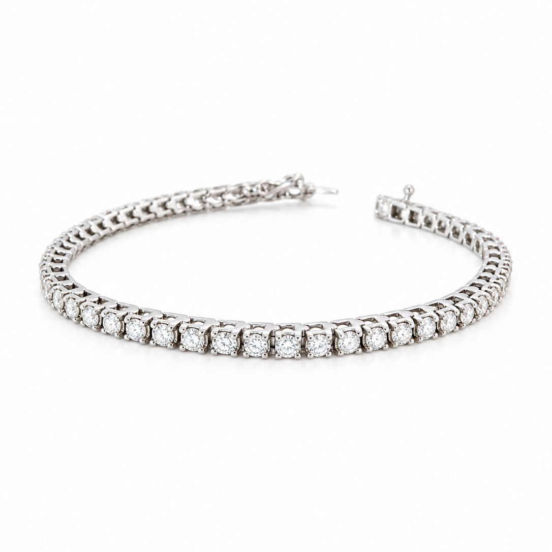 A beautiful tennis bracelet set with approximately sixty brilliant cut white diamonds to a total carat weight 3.50 carats.
