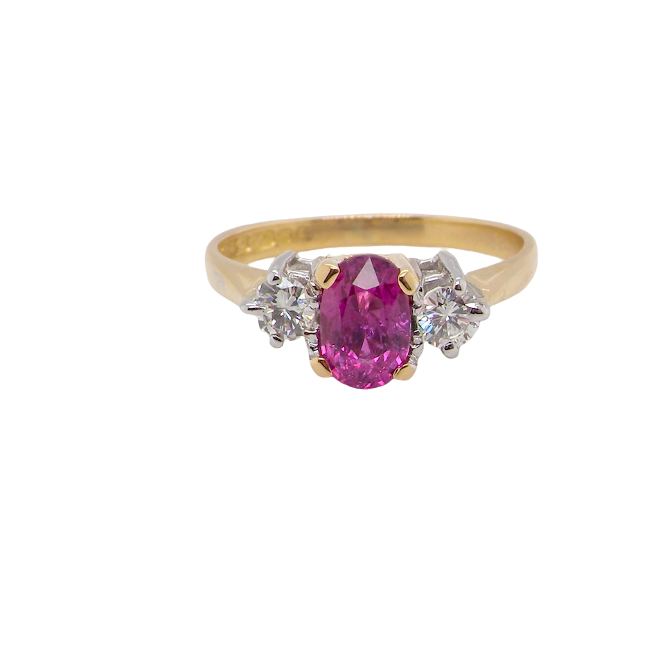 A beautifully crafted vintage ruby trilogy ring in rich 18-carat gold