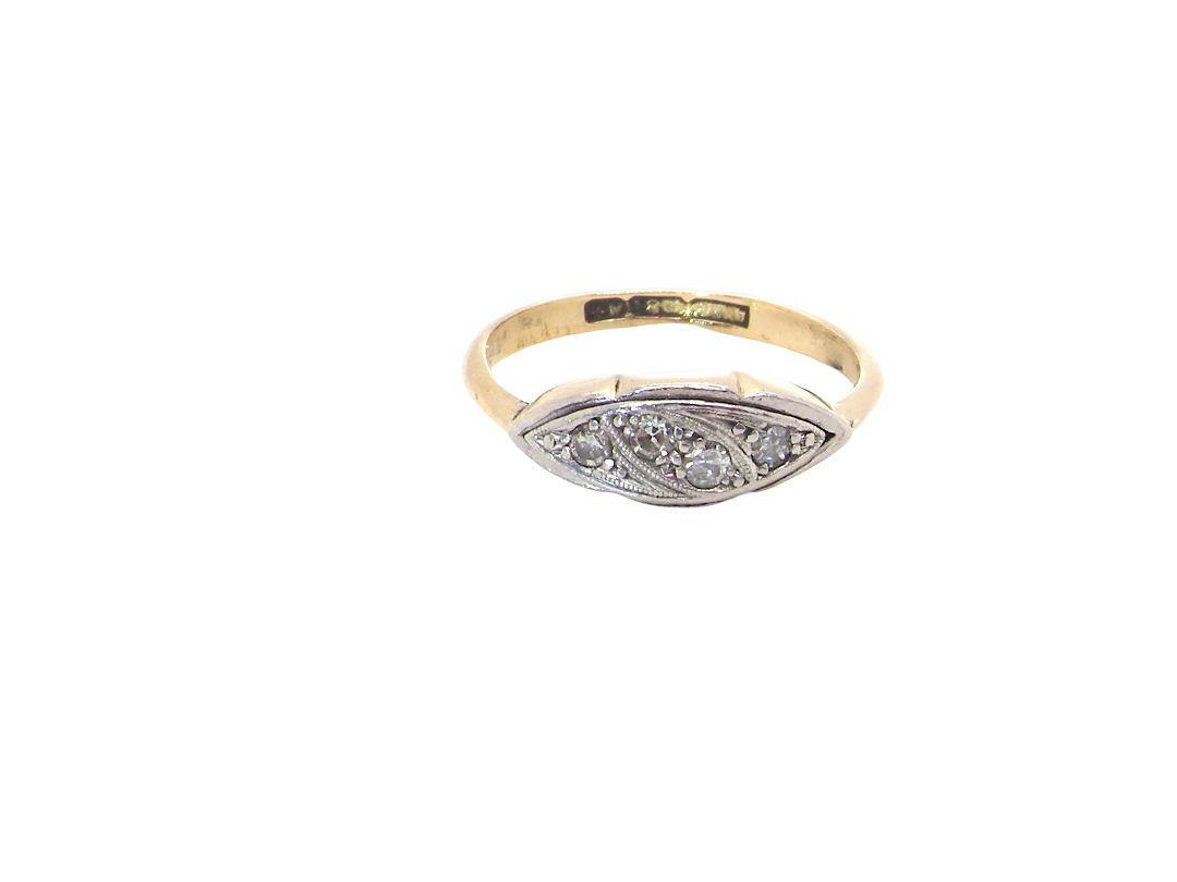 A vintage-style oval ring featuring a yellow gold band and a silver-toned bezel-set setting with small clear stones, shown on a plain white background.