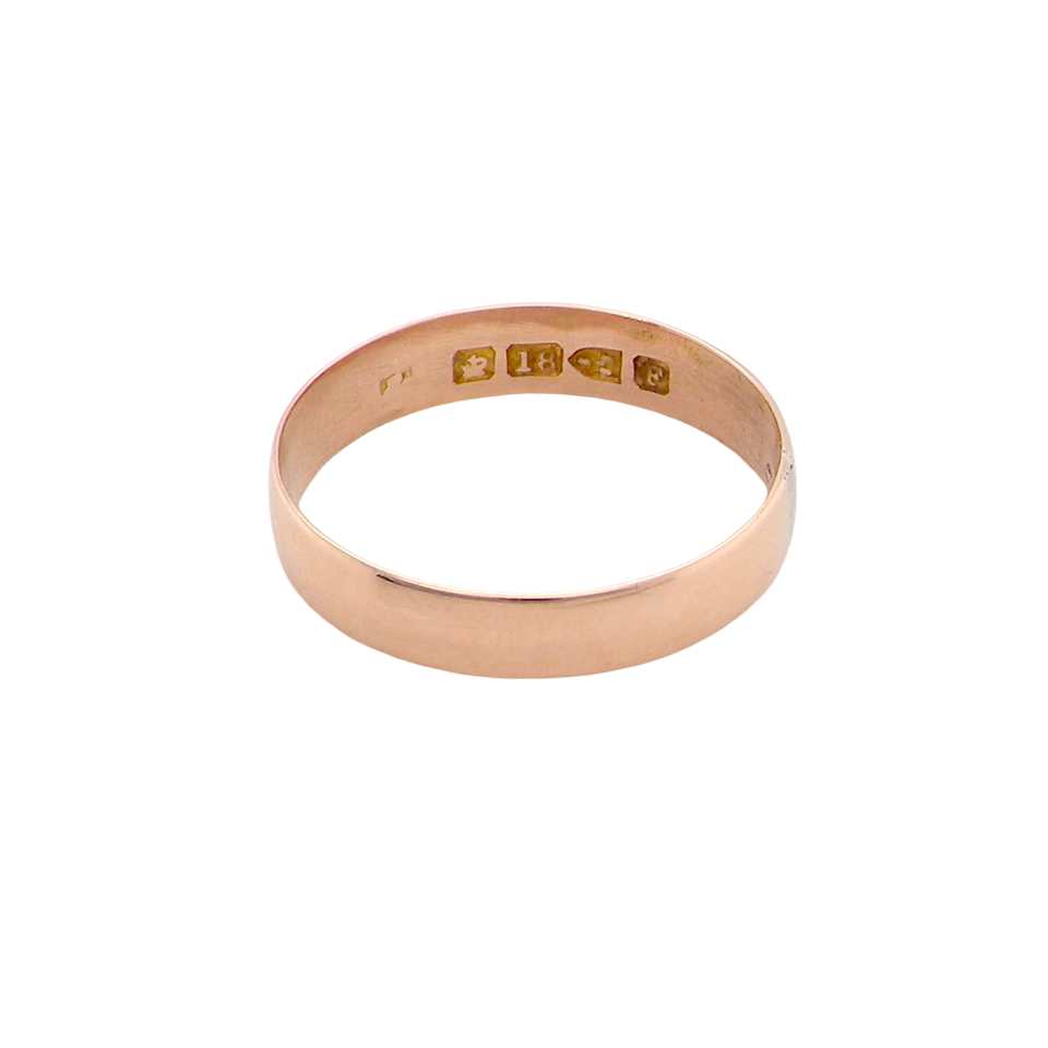 A classic 18 carat rose gold wedding ring.
Plain polished finish, 3.8mm wide. weight 2 grams.
