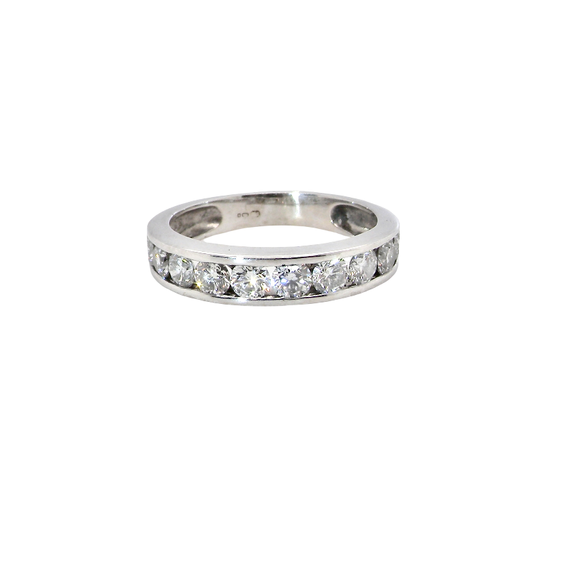 A silver-toned diamond eternity ring with a channel-set row of round-cut diamonds on a plain white background.