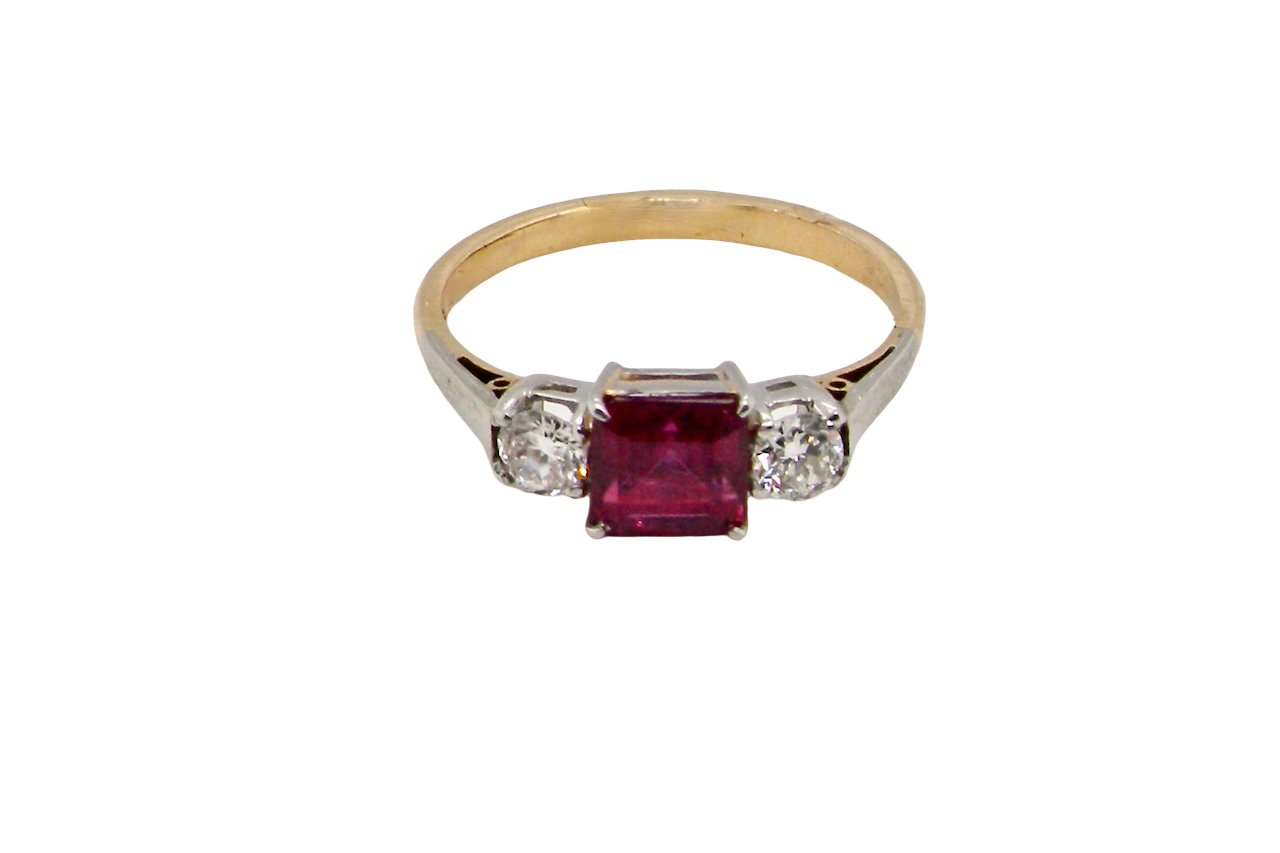 A classic Ruby and Diamond trilogy ring