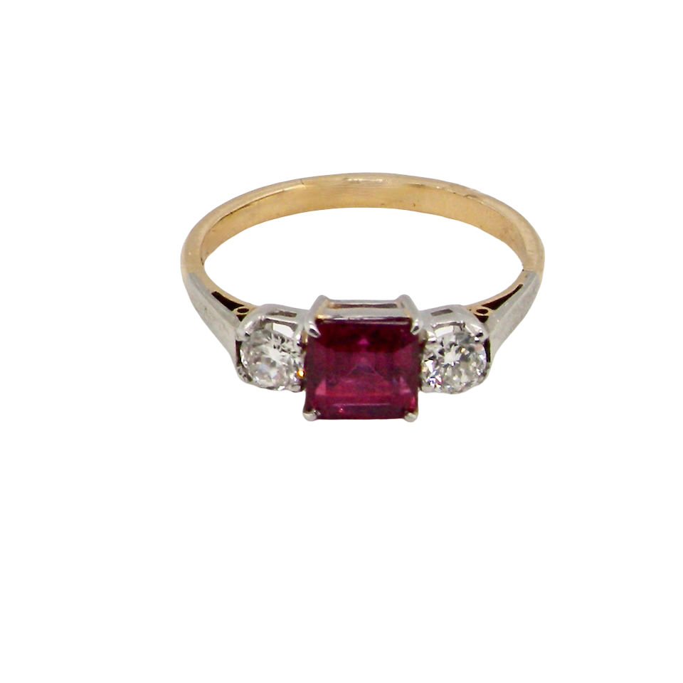 A classic Ruby and Diamond trilogy ring
