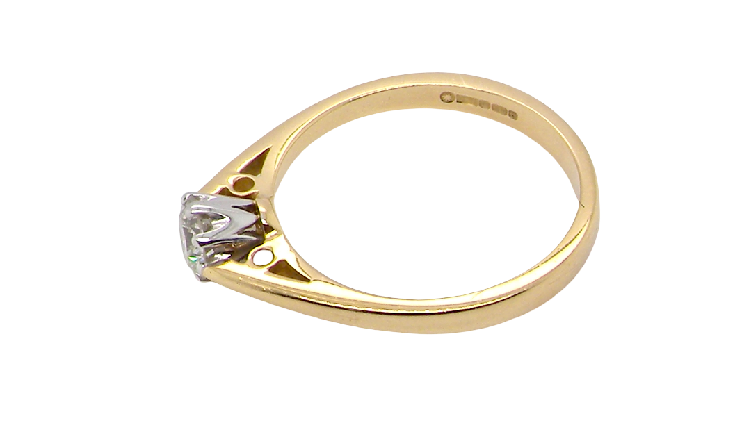 A classic solitaire ring. Features a single brilliant cut white diamond, measures 5mm (est 0.50 carats) Colour H-j, clarity Si.
Head is claw set, platinum, head 5.2mm, depth 5.4mm, weight 2.9 grams.
side