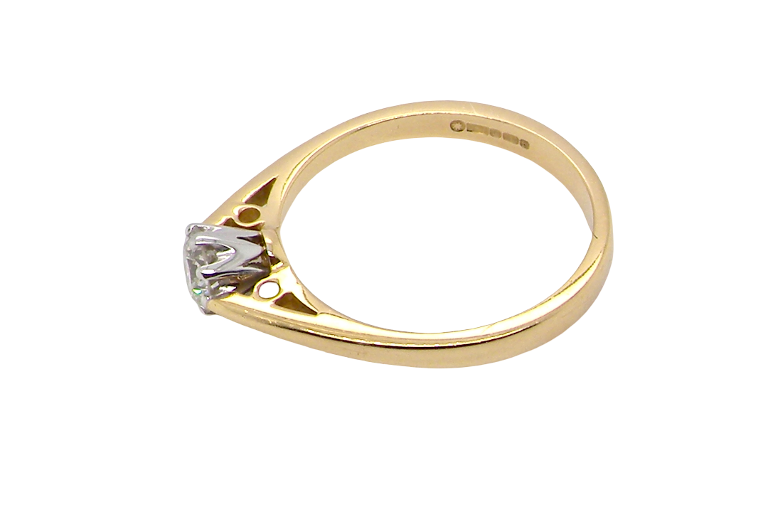 A classic solitaire ring. Features a single brilliant cut white diamond, measures 5mm (est 0.50 carats) Colour H-j, clarity Si.
Head is claw set, platinum, head 5.2mm, depth 5.4mm, weight 2.9 grams.
side