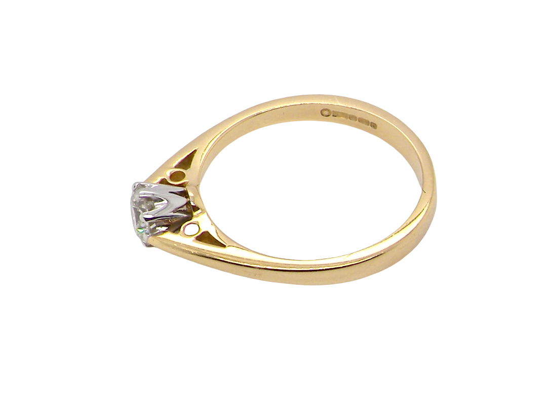 A classic solitaire ring. Features a single brilliant cut white diamond, measures 5mm (est 0.50 carats) Colour H-j, clarity Si.
Head is claw set, platinum, head 5.2mm, depth 5.4mm, weight 2.9 grams.
side
