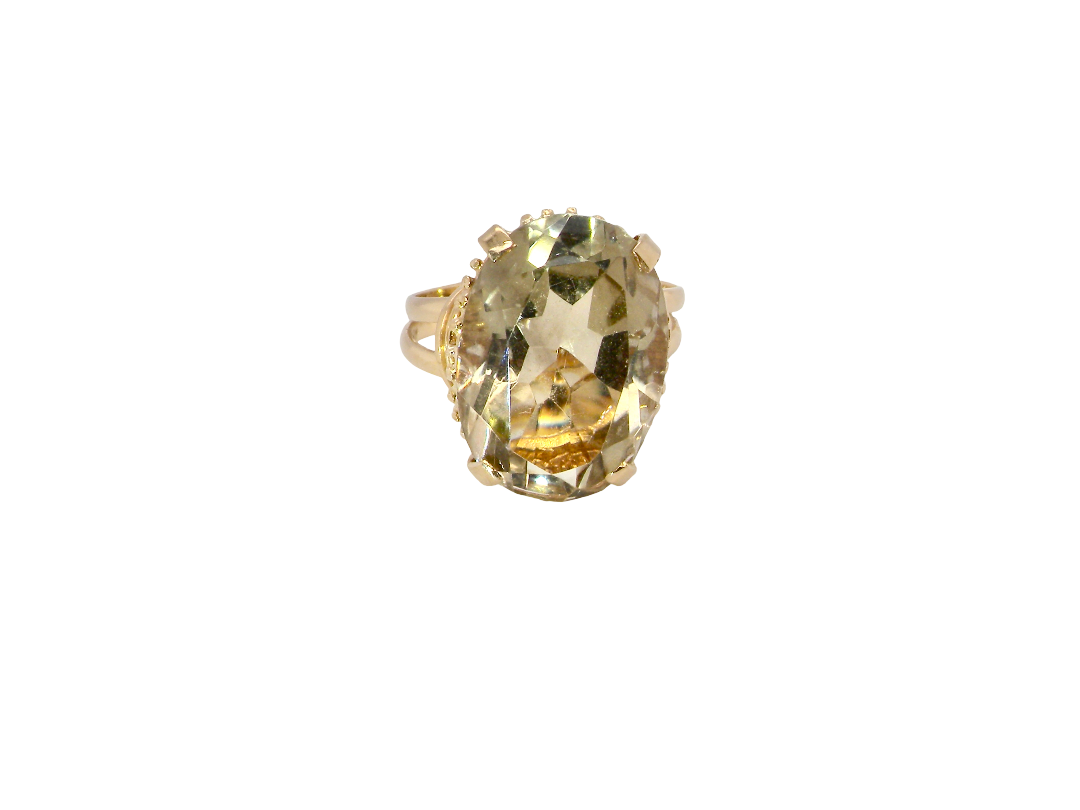 A continental dress ring that tests as 18 carat gold. Features a large citrine gemstone, that measures 18x13mm, depth 9mm. Golden yellow . 