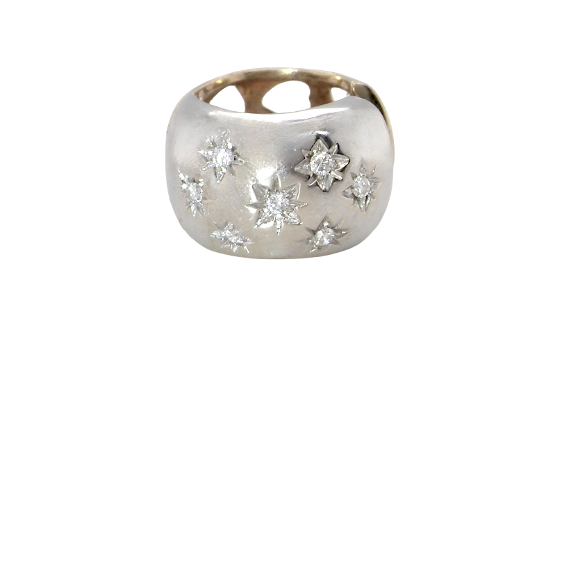 A cuff style hoop earring. The front part is 18 carat white gold * set with seven small white diamonds,