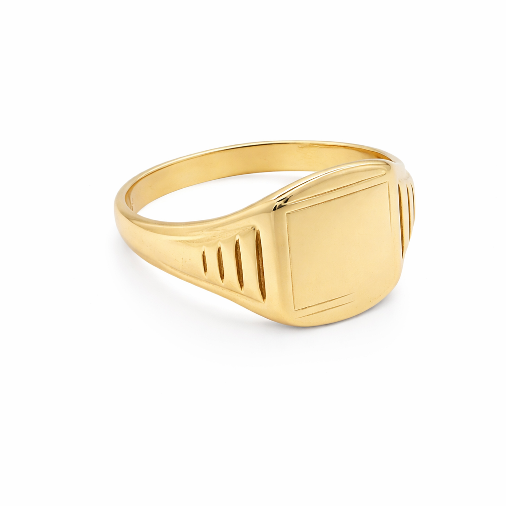 A cushion shaped signet ring. Plain head 14x11mm,