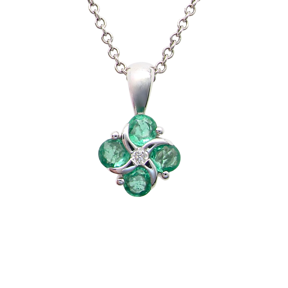 A delicate pendant crafted in 18ct white gold, featuring a cluster of 4 round emeralds,