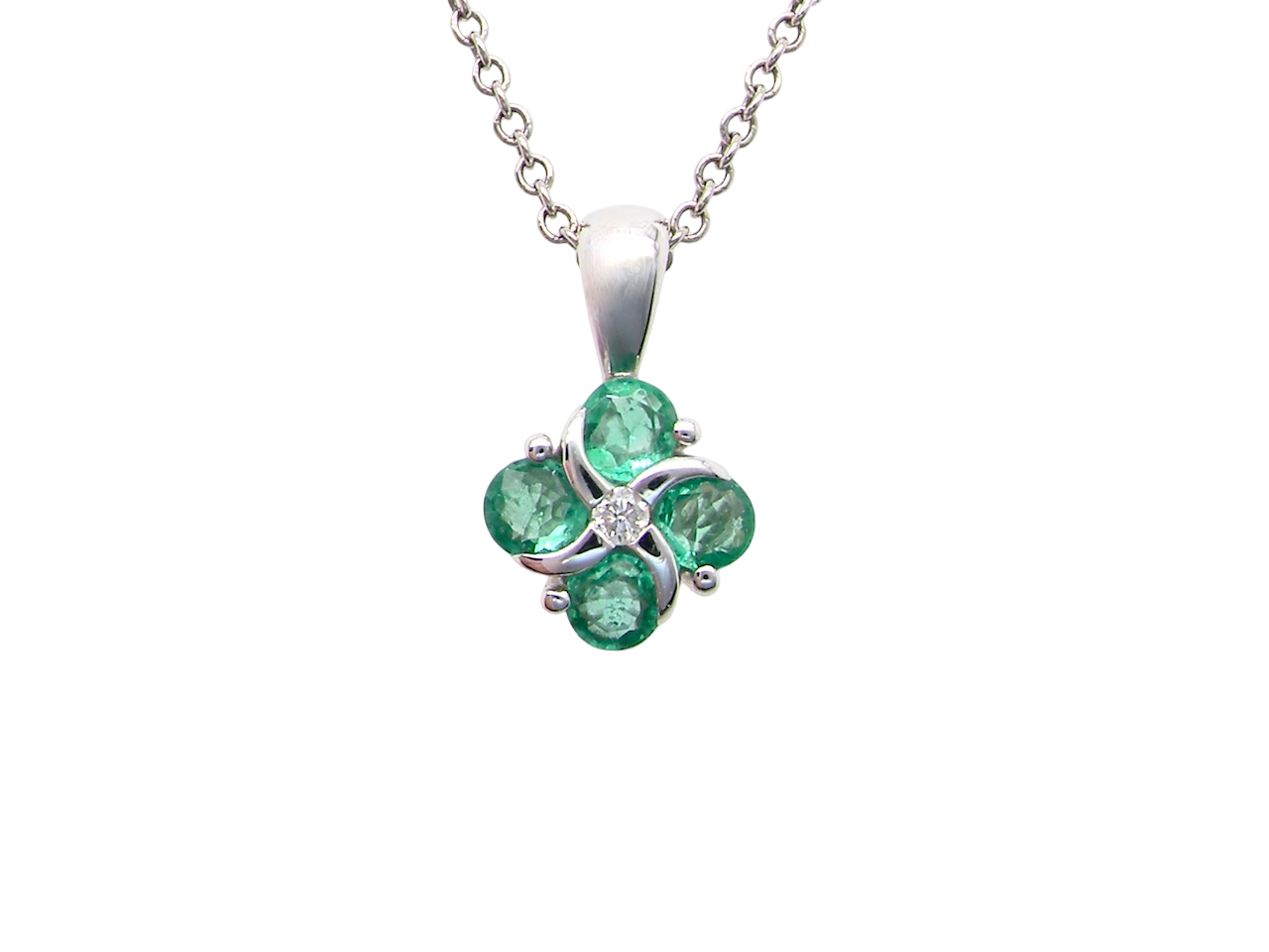 A delicate pendant crafted in 18ct white gold, featuring a cluster of 4 round emeralds,