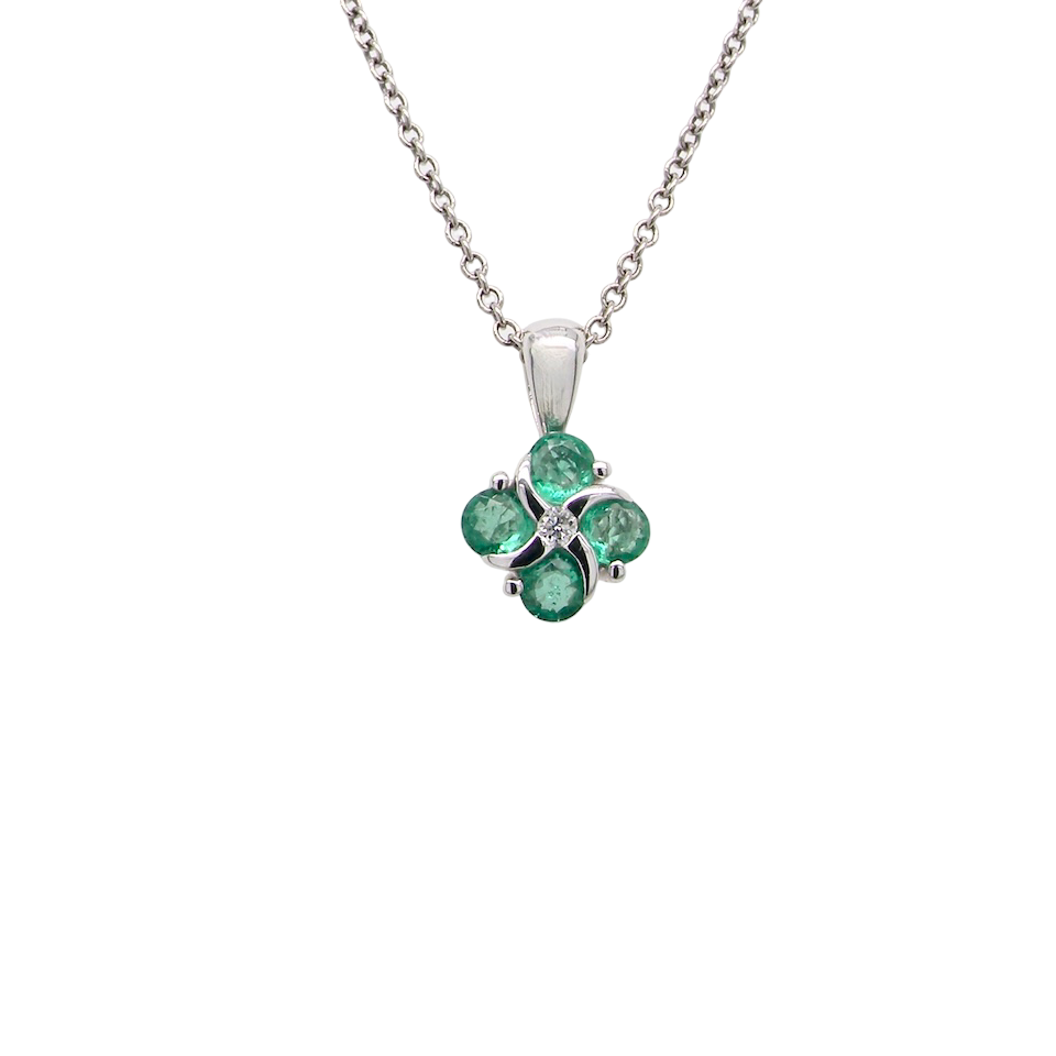 A delicate pendant crafted in 18ct white gold, featuring a cluster of four round emeralds,